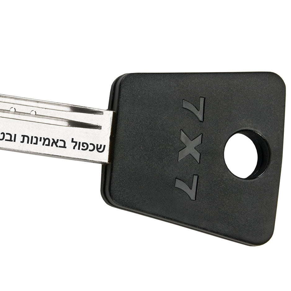 Black key blade with '7x7' branding on a white background