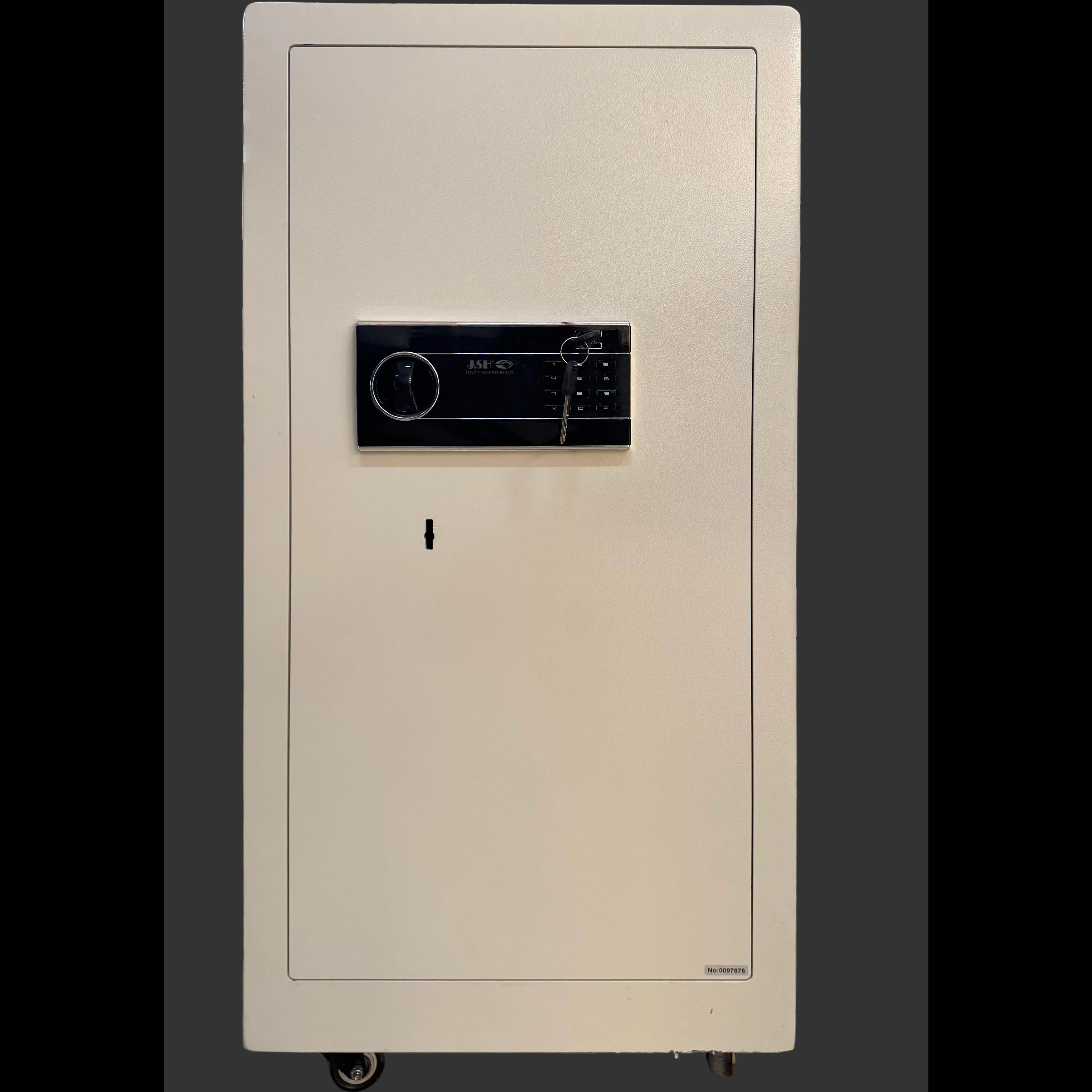 Beige safe with digital keypad on a store floor